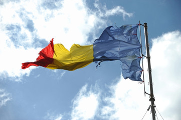 Romanian flag ripped of
