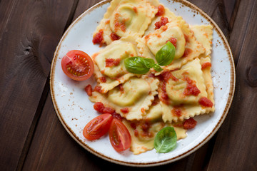 Ravioli stuffed with mozzarella and served with tomato sauce