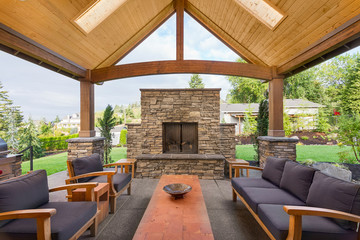 Beautiful Covered Patio Outside New Luxury Home - obrazy, fototapety, plakaty