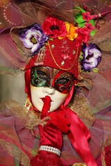 Participant at the annual venitian carnival of Annecy, France