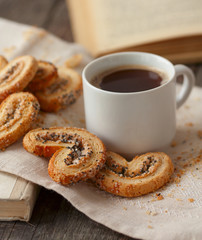 coffee and biscuits with poppy seeds and sugar