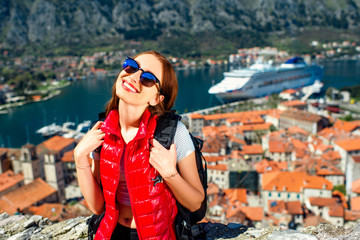 Woman traveling in old city Kotor, Montenegro