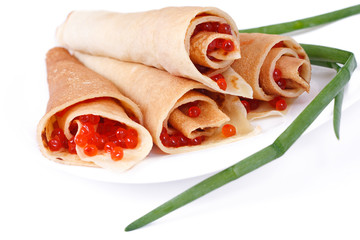 pancakes with caviar on white, close-up