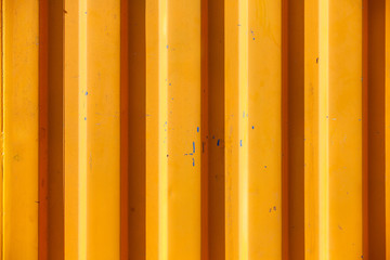 Orange textured and lined industrial background