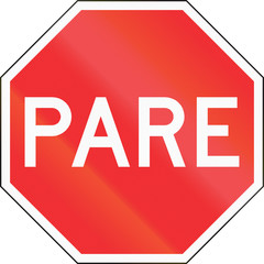 Pare sign in Chile. Pare means stop