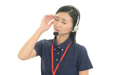 頭痛を訴えるオペレーター