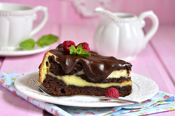 Piece of chocolate brownie with mascarpone.