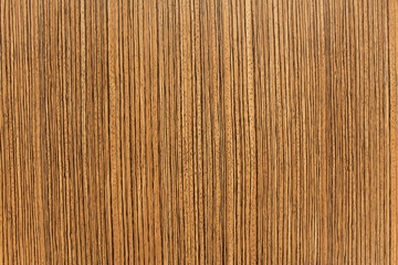 A wooden polished background with vertical dark stripes