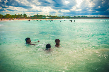 Relaxing on remote Tropical Paradise beach in Dominican Republic