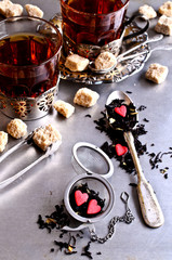 Tea on the background of the strainer