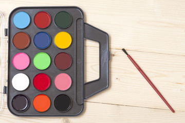 color palette on wood background