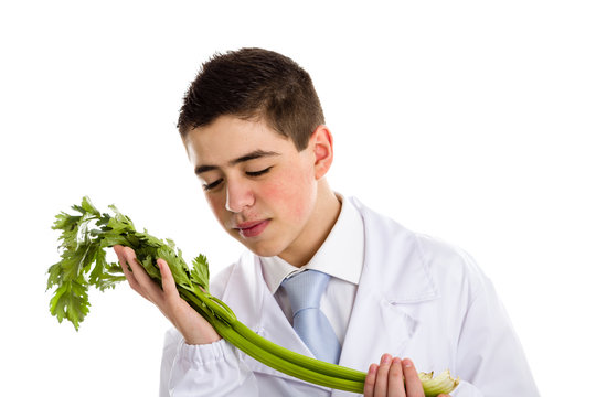 Boy doctor takes care of green celeris