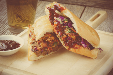 Barbeque Pulled Pork Sandwich with BBQ Sauce.