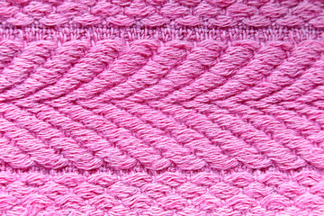 Motifs of pink towels in a macro.