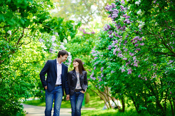 Happy couple in love walking at alley