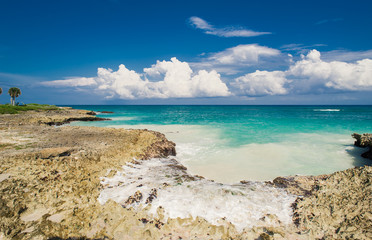 Fototapeta na wymiar Relaxing on remote Tropical Paradise beach in Dominican Republic