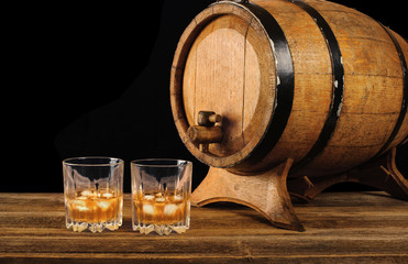 Whiskey and oak barrel