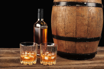 Whiskey and oak barrel