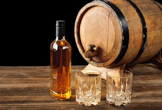 Whiskey and oak barrel