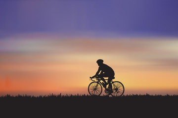 Fototapeta na wymiar Mountain bike rider in wild meadow nature landscape