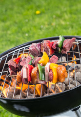Delicious vegetable and meat skewer on grill