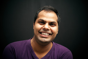 Obraz premium Handsome Indian man laughing