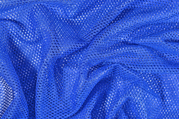 Blue crumpled nonwoven fabric background