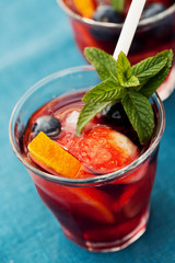 Refreshing sangria (punch) with fruits, picnic idea