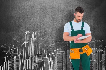 Composite image of repairman writing on a clipboard
