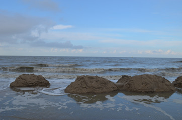 big pile of sand in sea