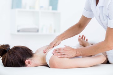 Obraz na płótnie Canvas Physiotherapist doing neck massage