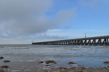long pier into sea on Belgian coast
