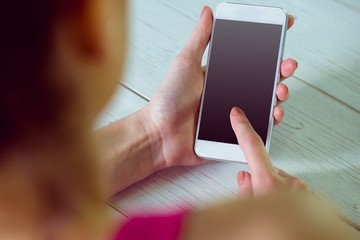 Casual woman using her smartphone