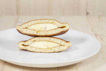 Dorayaki, Japanese Sweet  Pancakes on Wooden Table