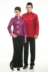 Wearing Chinese clothing waiter in front of a white background
