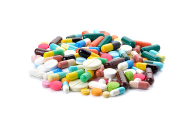 pills and capsules on white background