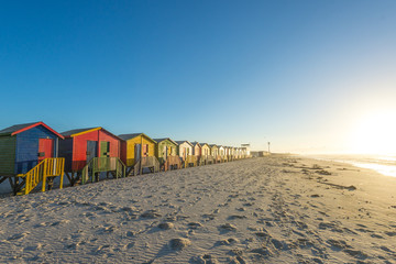 Sunrise at the famous colorful beach huts at Muizenberg Beach ou