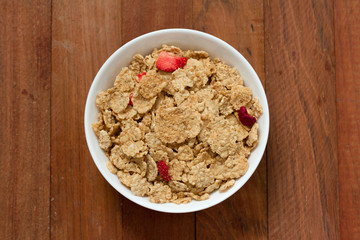cereals with dry fruits in white bowl