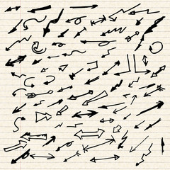 Illustration of arrows on sheet of lined paper