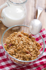 granola in bowl and milk