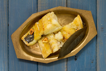 fried cod fish on dish