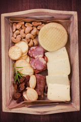 cheese with cashew, smoked sausages and cookies