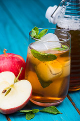 Refreshing apple and mint juice with ice