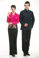 Wearing Chinese clothing waiter in front of a white background