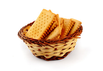 Pile of tea biscuits in a straw basket