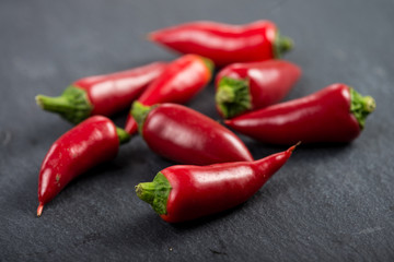 Burning hot vibrant red mexican chilli peppers