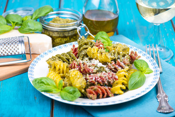 Italian pasta with pesto and fresh basil