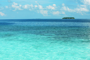 Naklejka na ściany i meble View of beautiful blue ocean water and island