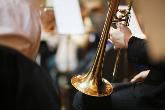 Musician hand holding a trumpet