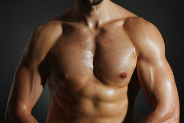 Fototapeta premium Muscle young man close up